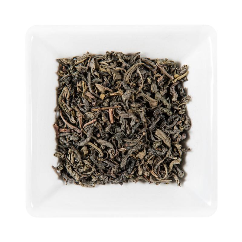 Organic Chun Mee green tea with fine curved leaves and a fresh, gently vegetal character.