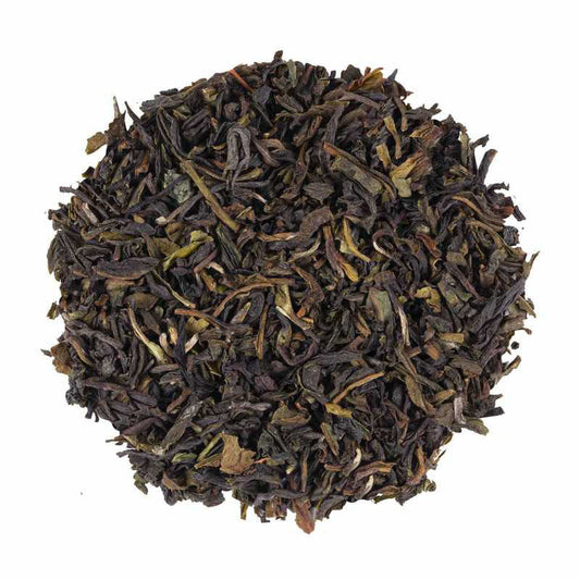 Darjeeling FTGFOP First Flush black tea with fine whole leaves, delicate tips, and a fresh floral character.