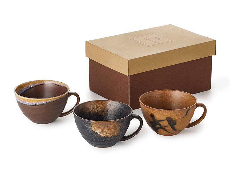 3 cups from Japanese ceramics in a gift box, cups have 3 different motifs and finished with reactive glaze