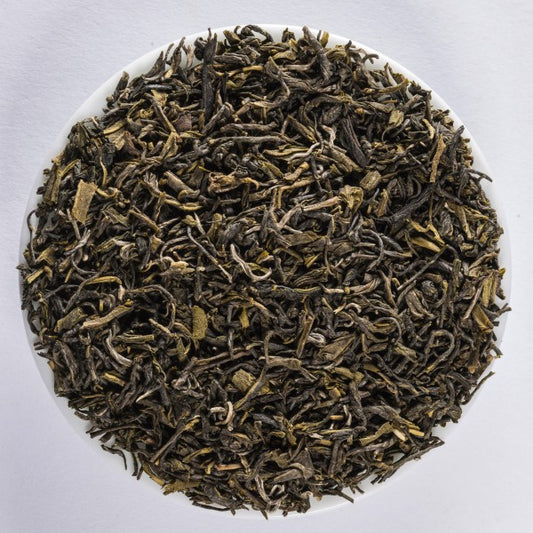 Organic Nepalese Mao Feng green tea with tender twisted leaves and a fresh, floral and gently tart character.