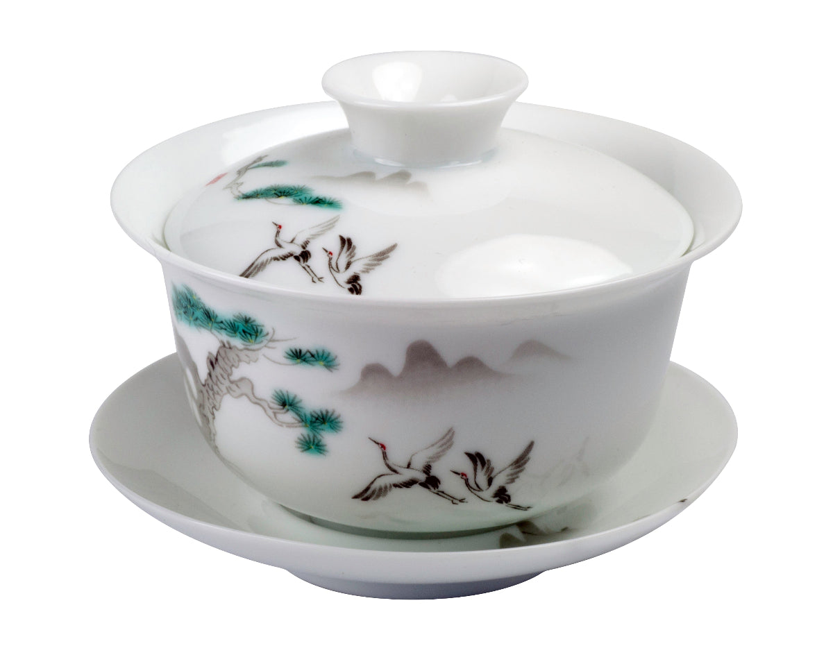 Porcelain Gaiwan Songhe with Crane and pine motif, with saucer and lid.