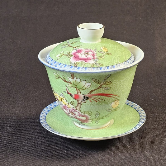 Porcelain green Gaiwan with floral design.