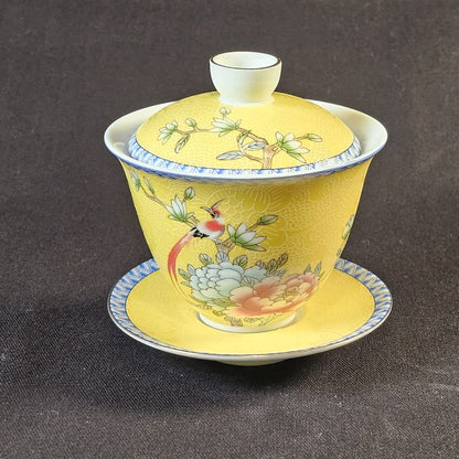 Yellow Porcelain Gaiwan with floral design.