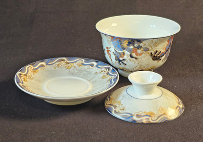 White porcelain gaiwan with dragon motif.