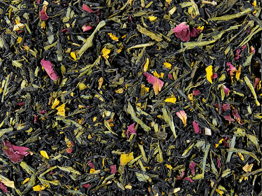 The Emperor’s 7 Treasures loose-leaf black and green tea blend with rose petals and golden sunflower blossoms by Lunula Tea.
