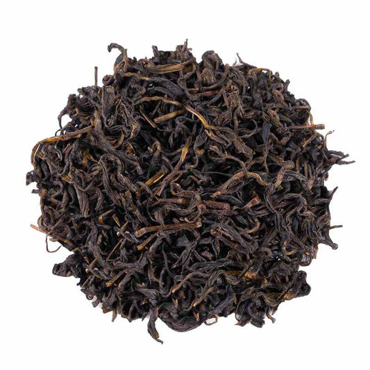 Yellow Tea loose-leaf tea with softly twisted leaves and a clear golden infusion by Lunula Tea.